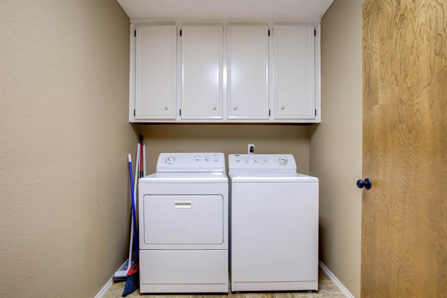 5304 90th Street Lubbock, TX 79424 - Photo 31 of 39 a utility room with dryer and washer