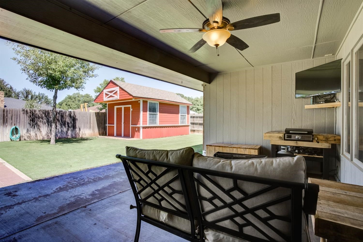 5304 90th Street Lubbock, TX 79424 - Photo 36 of 39 a dinning table and chairs in the patio