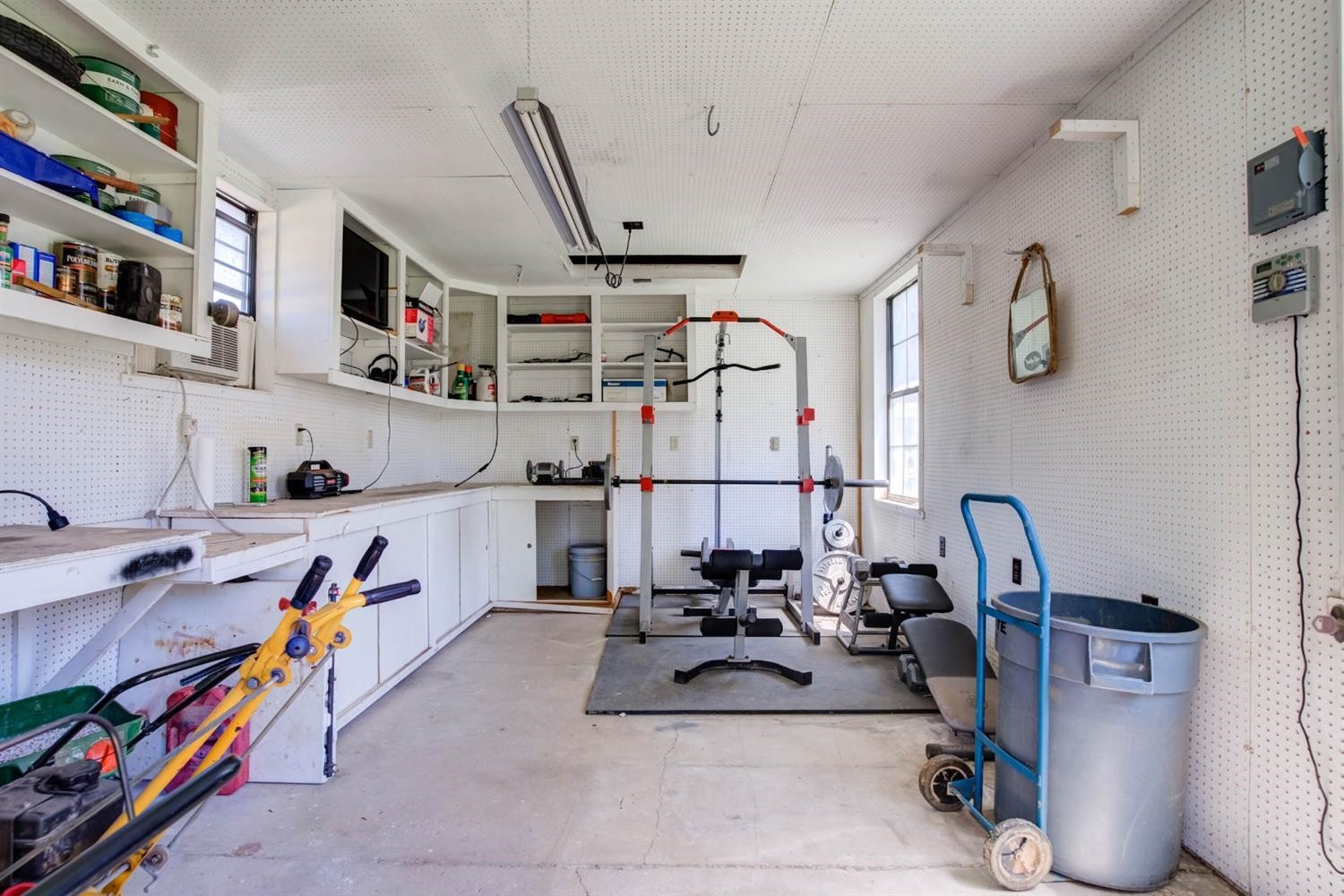5304 90th Street Lubbock, TX 79424 - Photo 39 of 39 a view of gym equipment with a view of bedroom