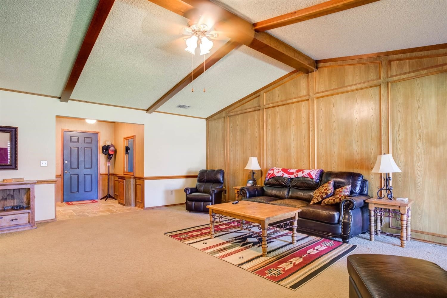 5304 90th Street Lubbock, TX 79424 - Photo 6 of 39 a living room with furniture a dining table and chairs with wooden floor