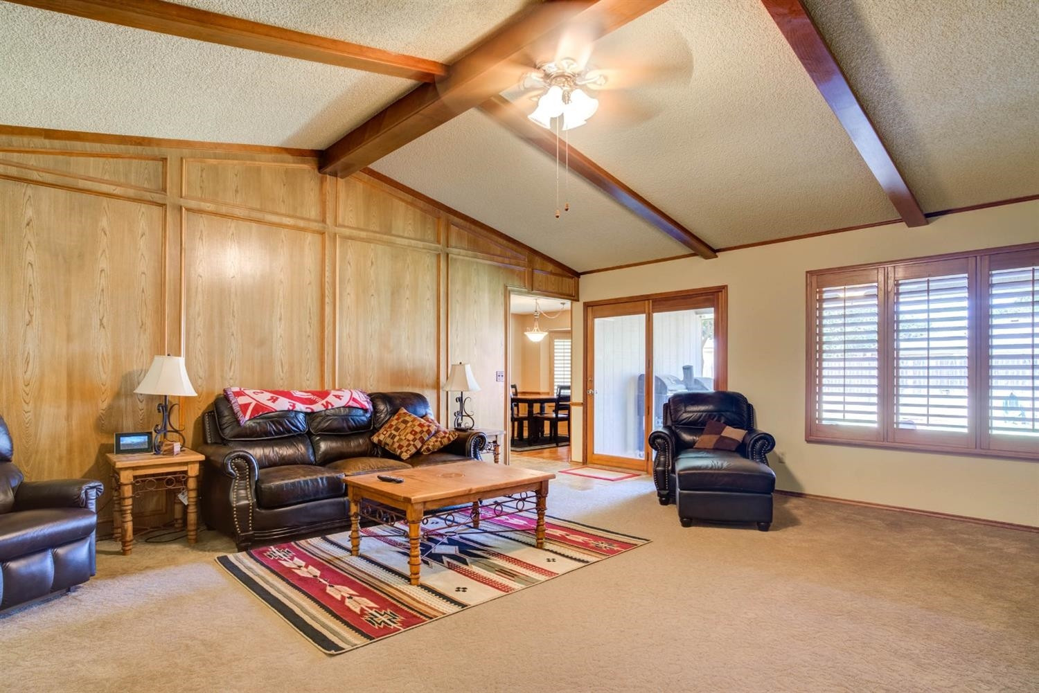 5304 90th Street Lubbock, TX 79424 - Photo 9 of 39 a living room with furniture a rug and a window