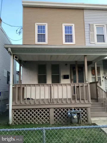 a view of a house with a porch