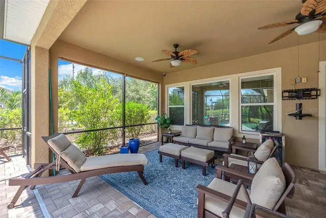 a bedroom with a bed and a chair