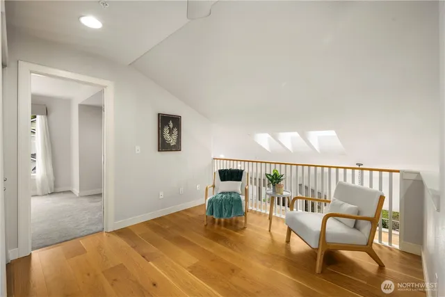 a balcony with table and chairs