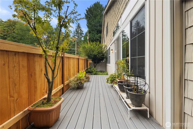 a view of roof deck with patio