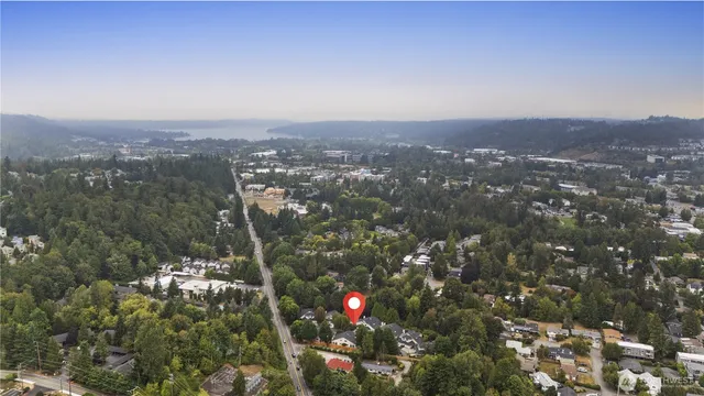 an aerial view of city and mountain
