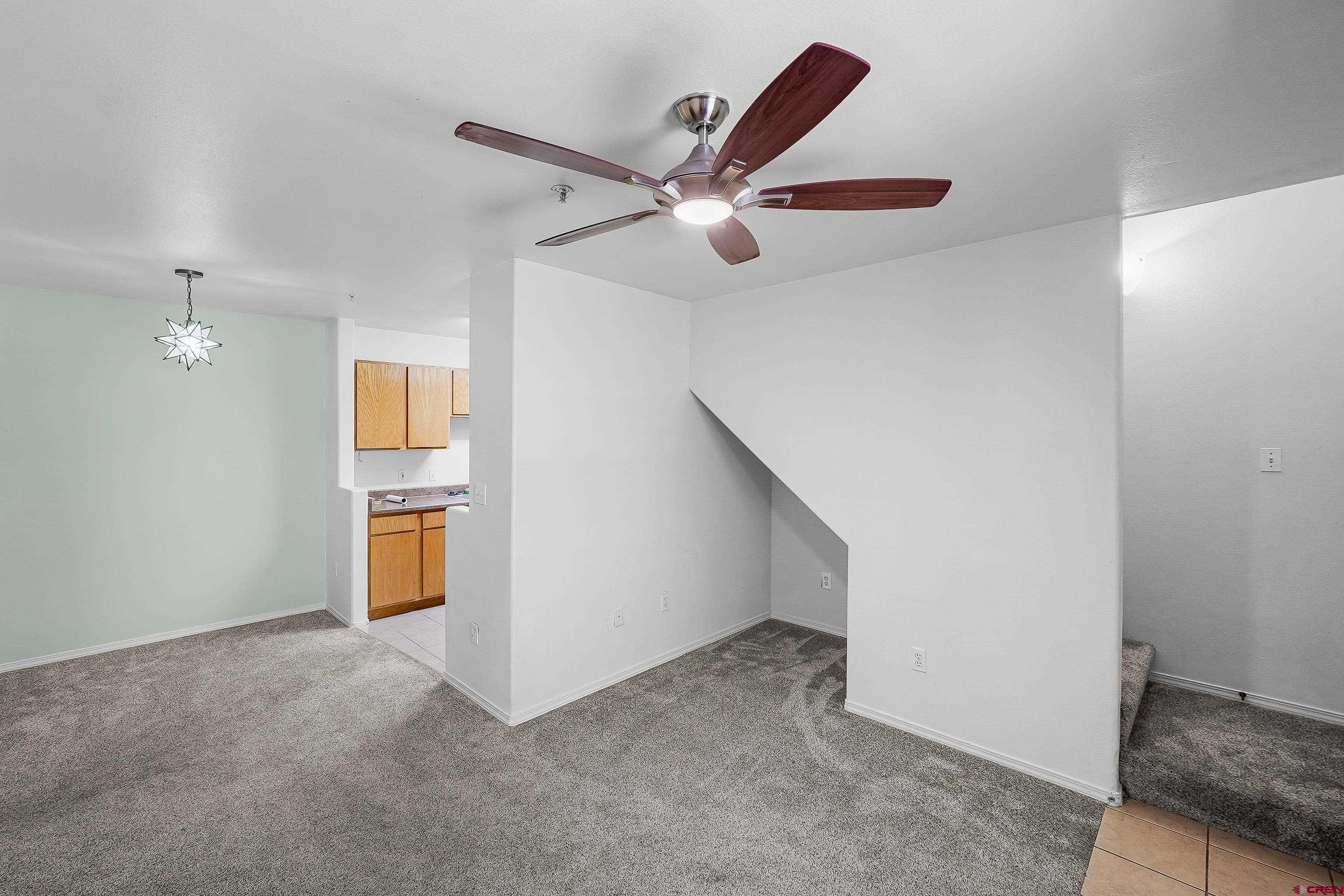 1100 Goeglein Gulch Road, Unit 163 Durango, CO 81301 - Photo 9 of 23 an empty room with closet and ceiling fan