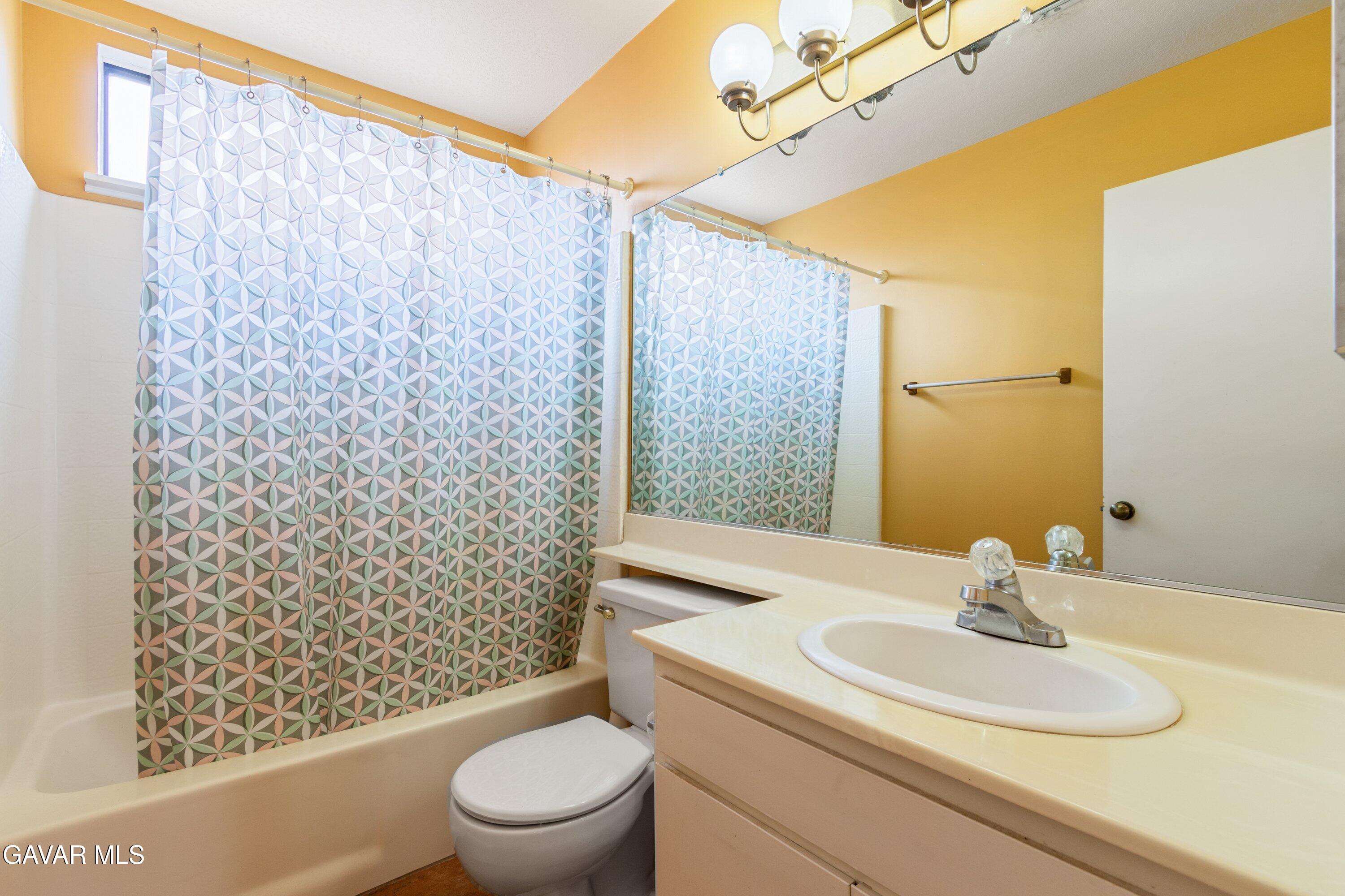 4625 Avenue R6 E Palmdale Ca East Palmdale, CA 93552 - Photo 11 of 25 a bathroom with a sink toilet and shower