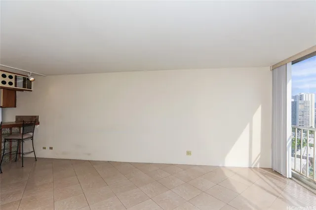 a view of an empty room and window