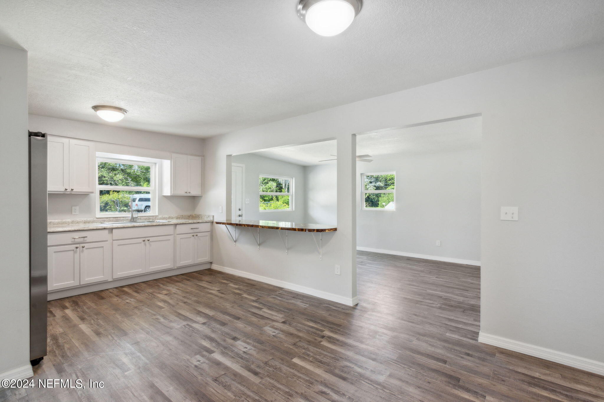9411 Orme Road Jacksonville, FL 32220 - Photo 16 of 33 a view of an empty room and window