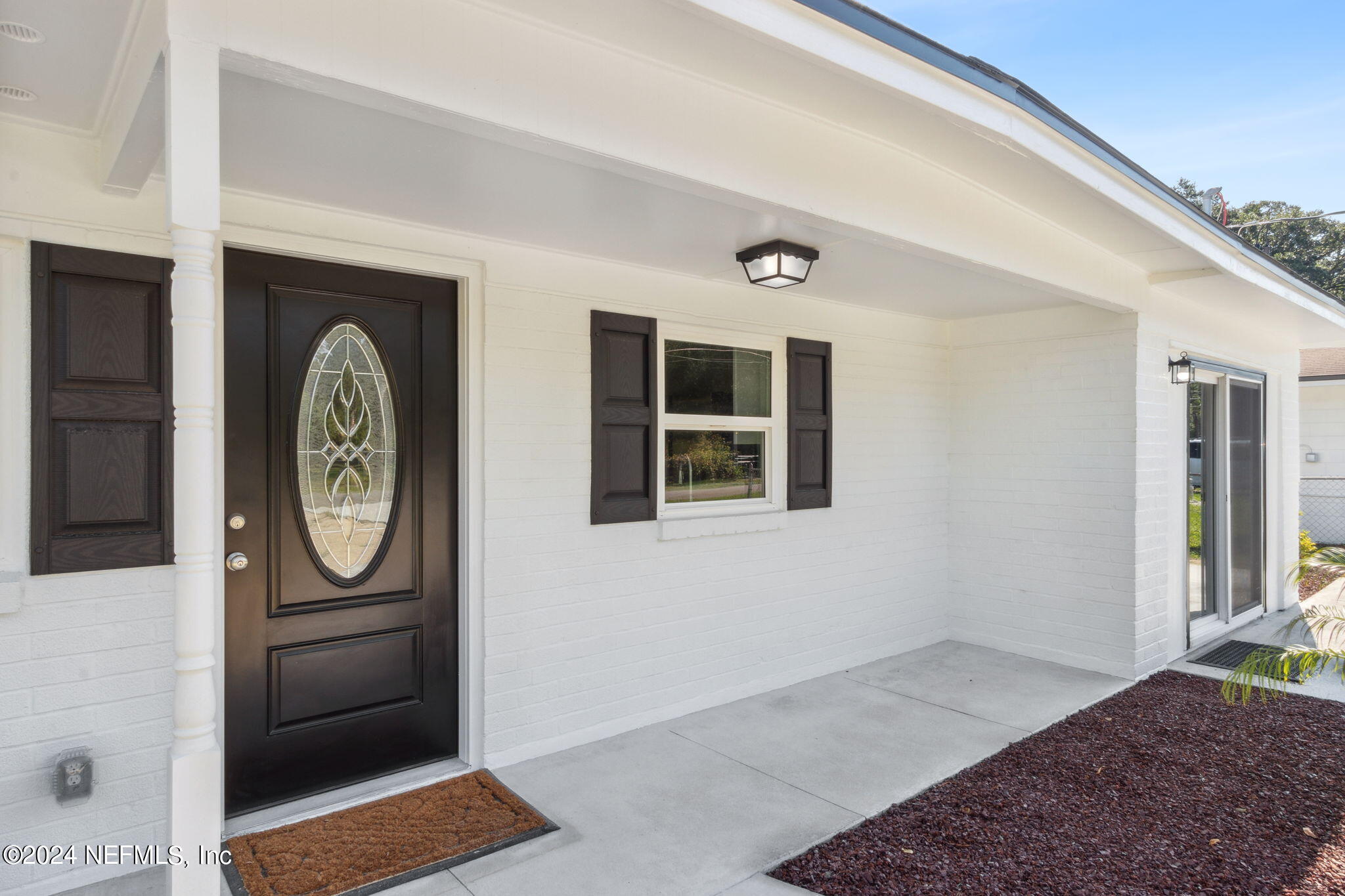 9411 Orme Road Jacksonville, FL 32220 - Photo 2 of 33 a view of a hallway with entryway