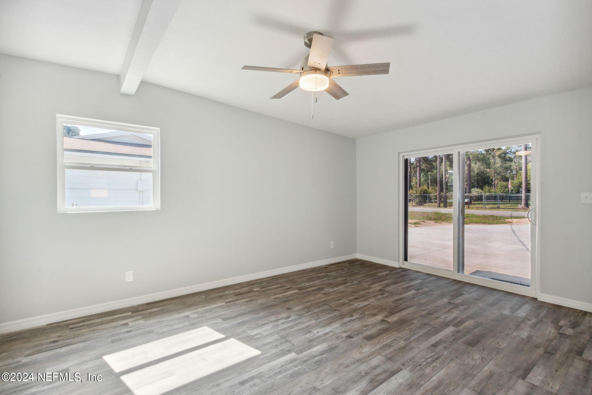9411 Orme Road Jacksonville, FL 32220 - Photo 23 of 33 a view of an empty room with a window