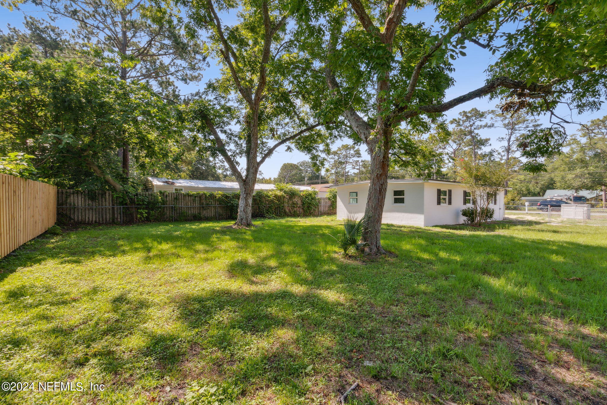 9411 Orme Road Jacksonville, FL 32220 - Photo 32 of 33 a view of a house with a yard