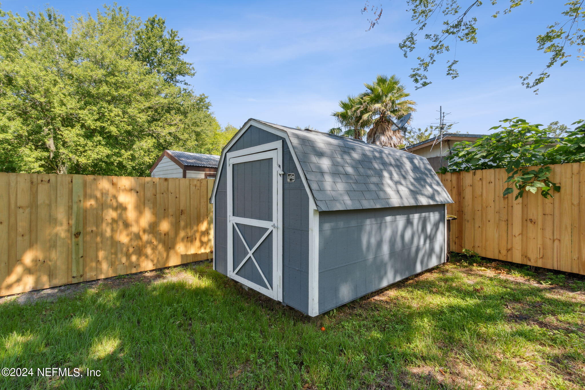 9411 Orme Road Jacksonville, FL 32220 - Photo 33 of 33 a view of a wooden fence