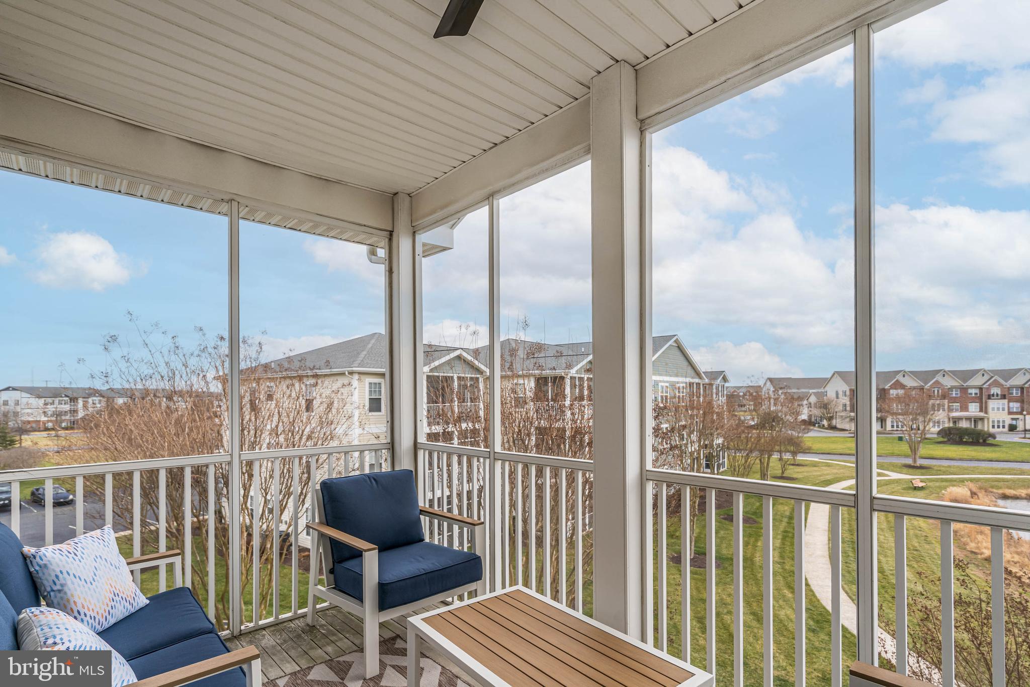 33156 North Village Loop, Unit 4302 Lewes, DE 19958 - Photo 21 of 34 a view of a city from a balcony