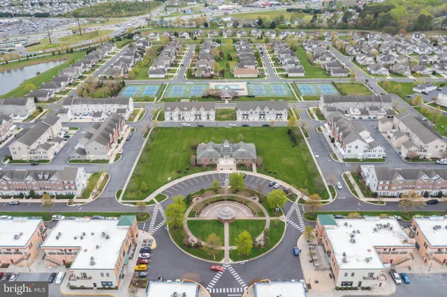 an aerial view of a swimming pool and outdoor space
