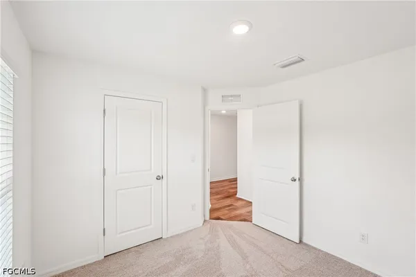 a view of a room with an empty space