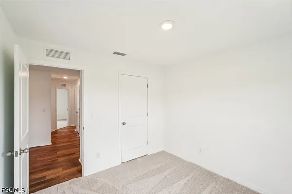 a view of a hallway with entryway