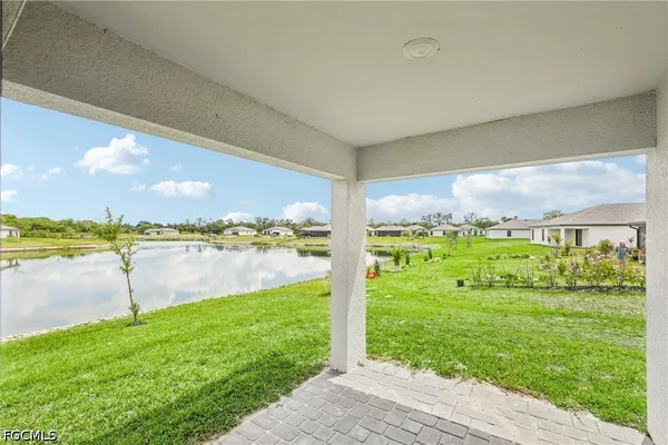 a view of a lake with a big yard