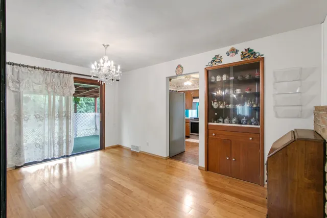 a kitchen with stainless steel appliances a stove sink and microwave