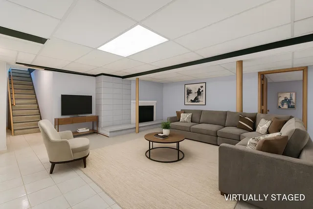 a view of an entryway with wooden floor and door