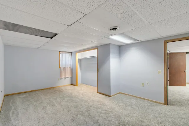 a front view of a house having a yard