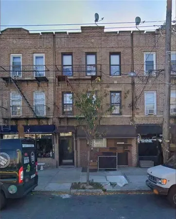 a car parked in front of a building