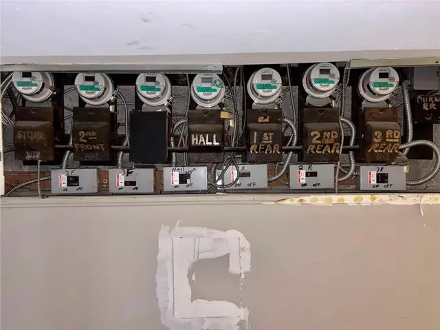 a bathroom with a mirror and a sink