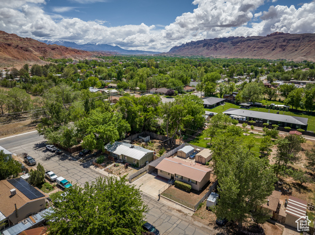 527 Palisade Drive Moab, UT 84532 - Photo 40 of 51 Drone / aerial view of a mountain backdrop