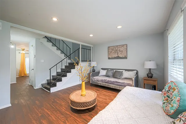 a living room with furniture and a table