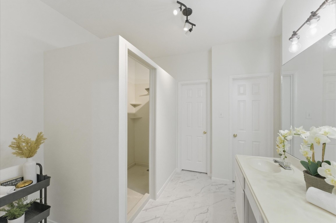 23834 Spring Dane Drive Spring, TX 77373 - Photo 11 of 19 An incredible walk-in shower offers plenty of space as well as some safety features.