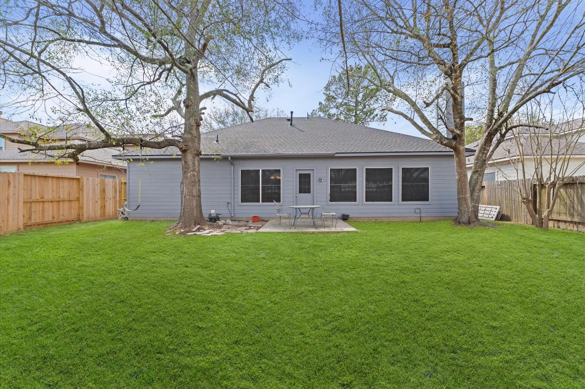 23834 Spring Dane Drive Spring, TX 77373 - Photo 14 of 19 a front view of house with yard and green space