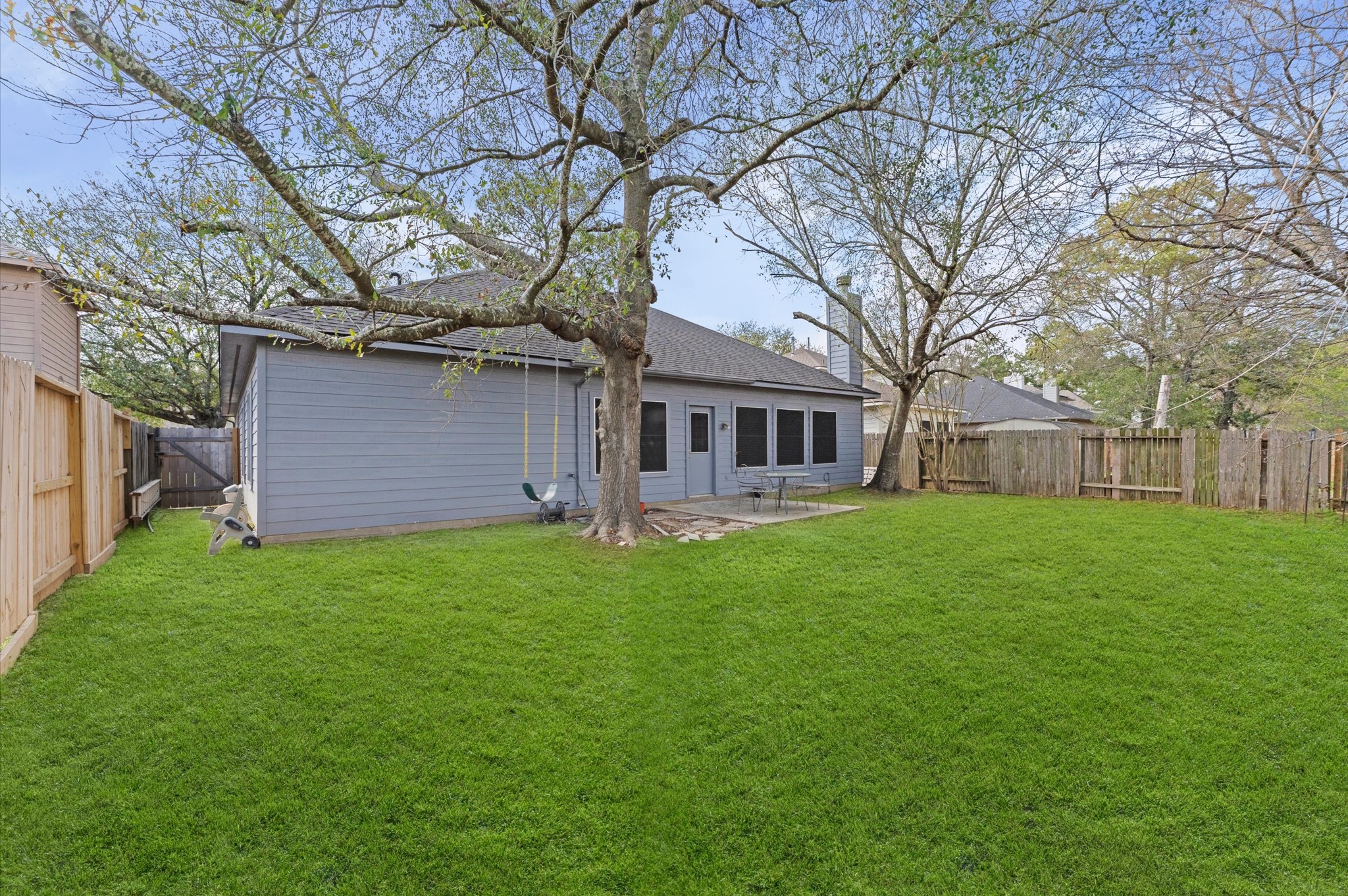 23834 Spring Dane Drive Spring, TX 77373 - Photo 16 of 19 There is a lot of opportunity here to add some seating or play equipment under the shade of a mature tree, with plenty of space left to relax and play.