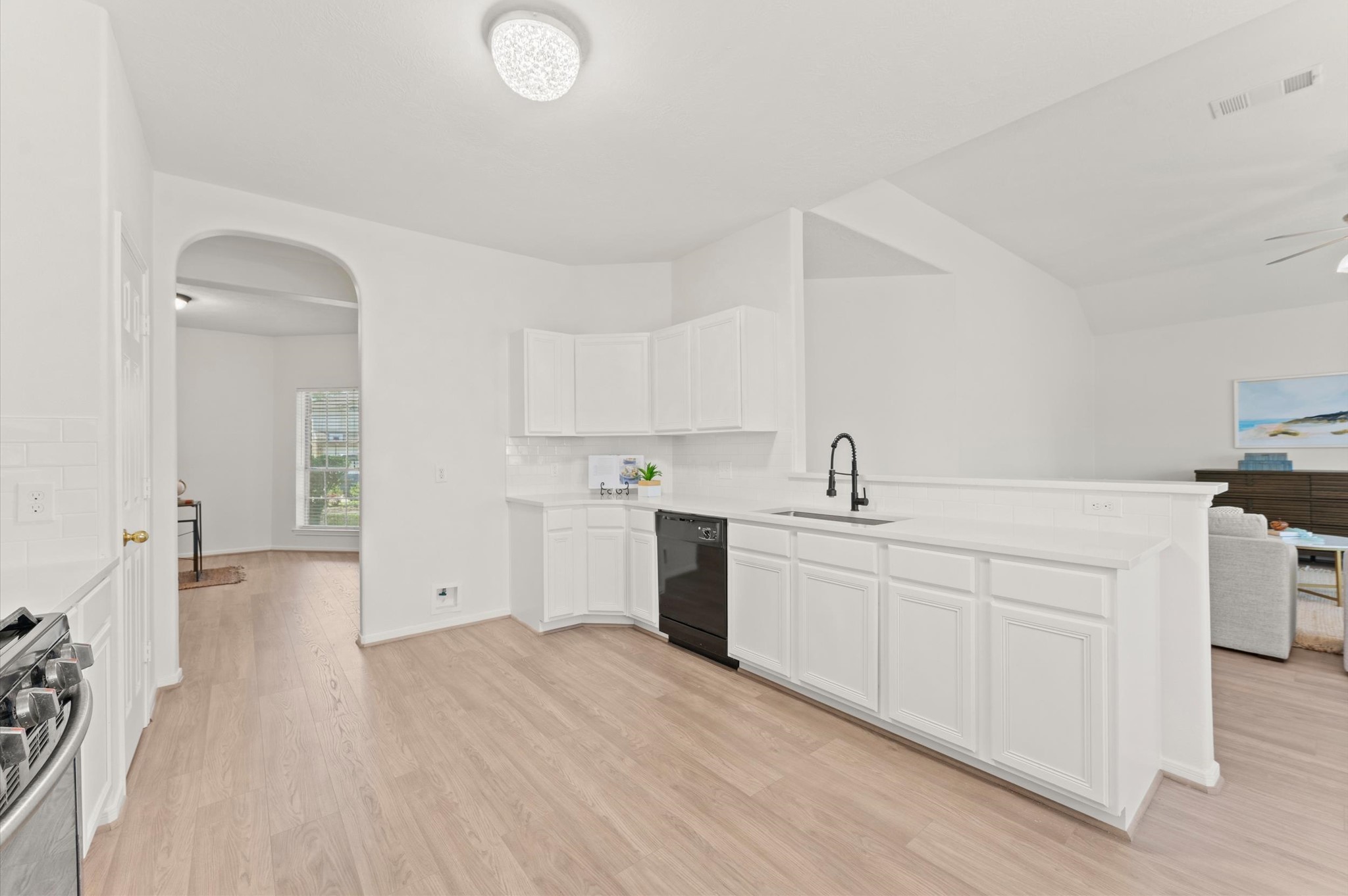 23834 Spring Dane Drive Spring, TX 77373 - Photo 7 of 19 Notice the space that awaits your refrigerator adjacent to more cabinets, making it easy to keep those countertops clutter-free.