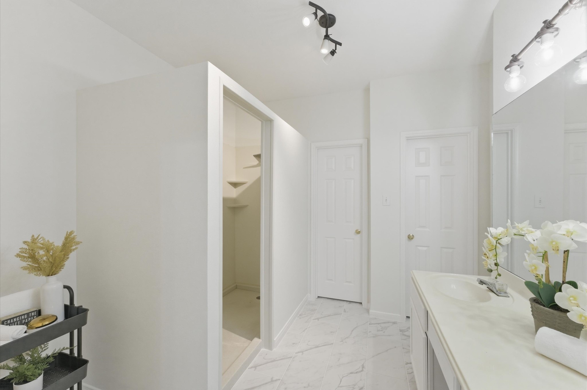 23834 Spring Dane Drive Spring, TX 77373 - Photo 10 of 19 a bathroom with a sink and a mirror