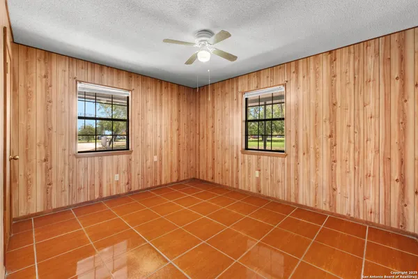 an empty room with windows