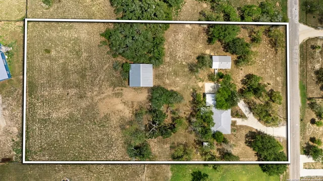 a black and white photo of a bench