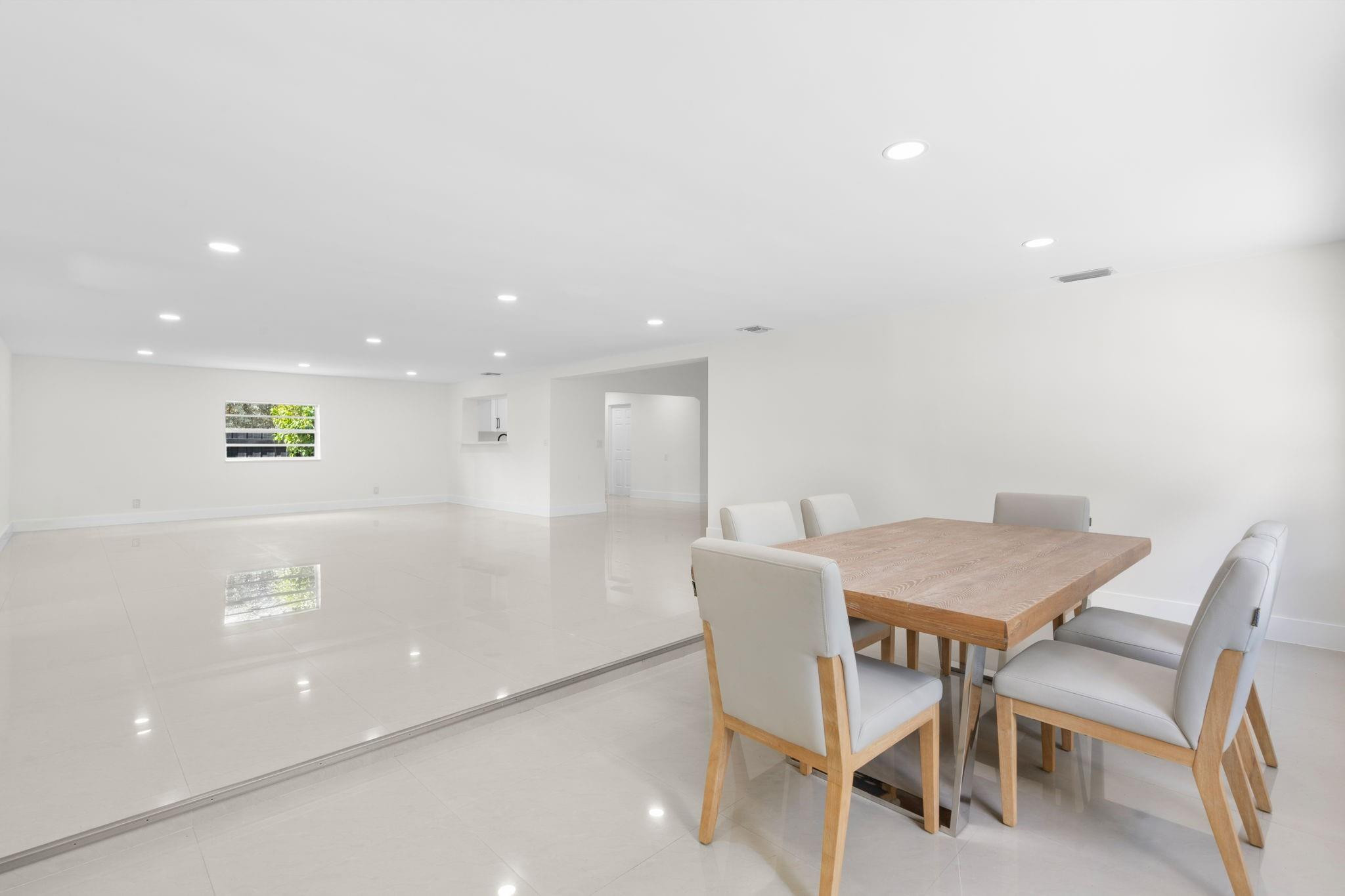 3262 Pierce Street Hollywood, FL 33021 - Photo 17 of 35 a view of a dining room with furniture