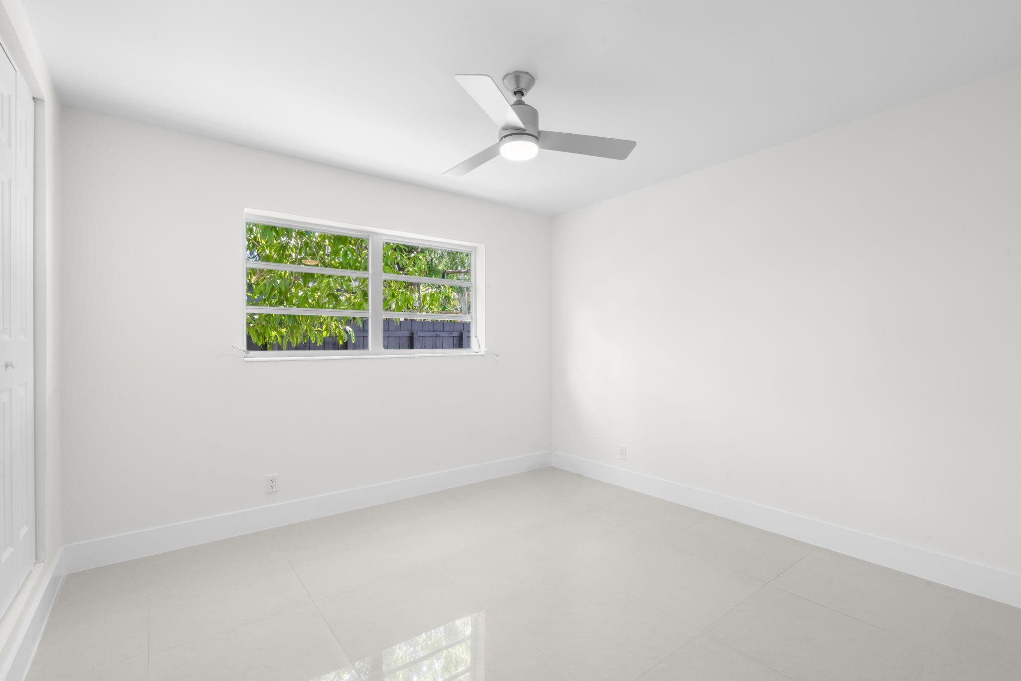 3262 Pierce Street Hollywood, FL 33021 - Photo 18 of 35 an empty room with a window