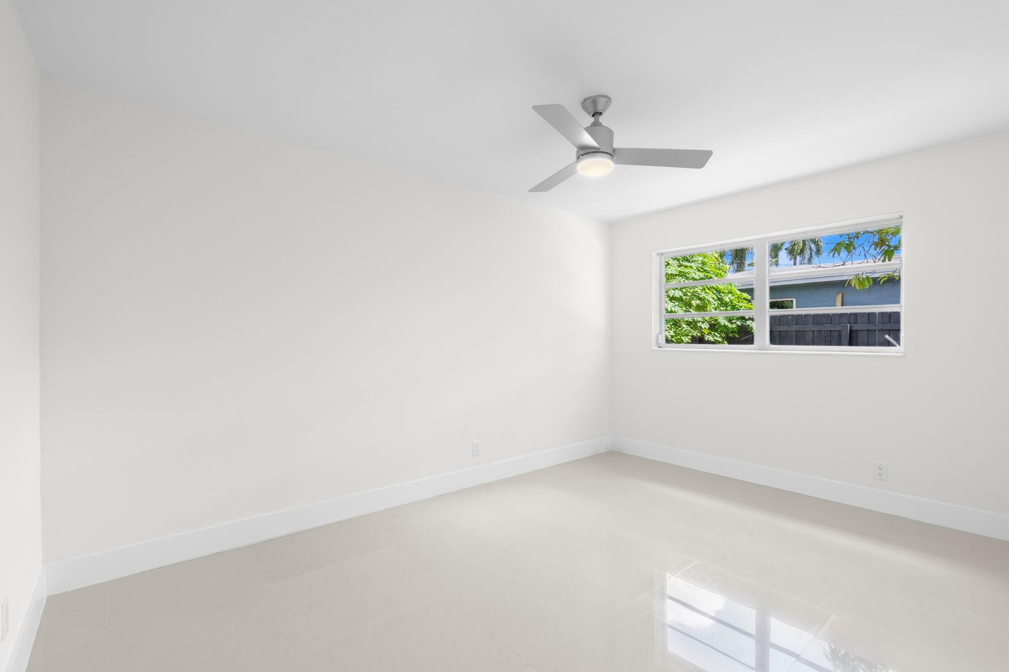 3262 Pierce Street Hollywood, FL 33021 - Photo 21 of 35 a view of an empty room with a window