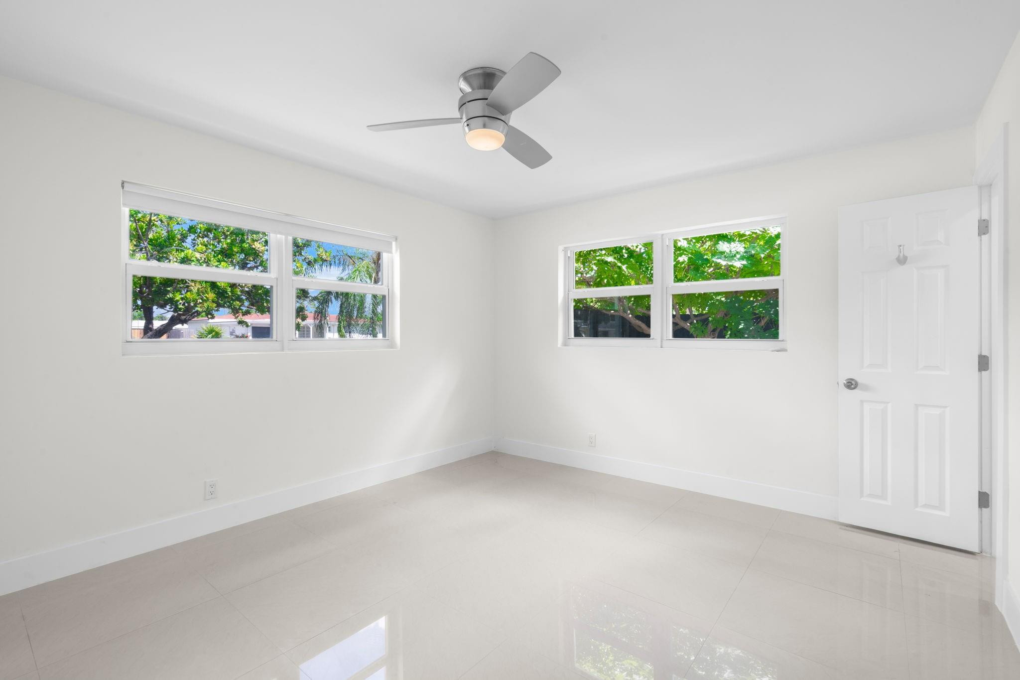 3262 Pierce Street Hollywood, FL 33021 - Photo 23 of 35 an empty room with a window