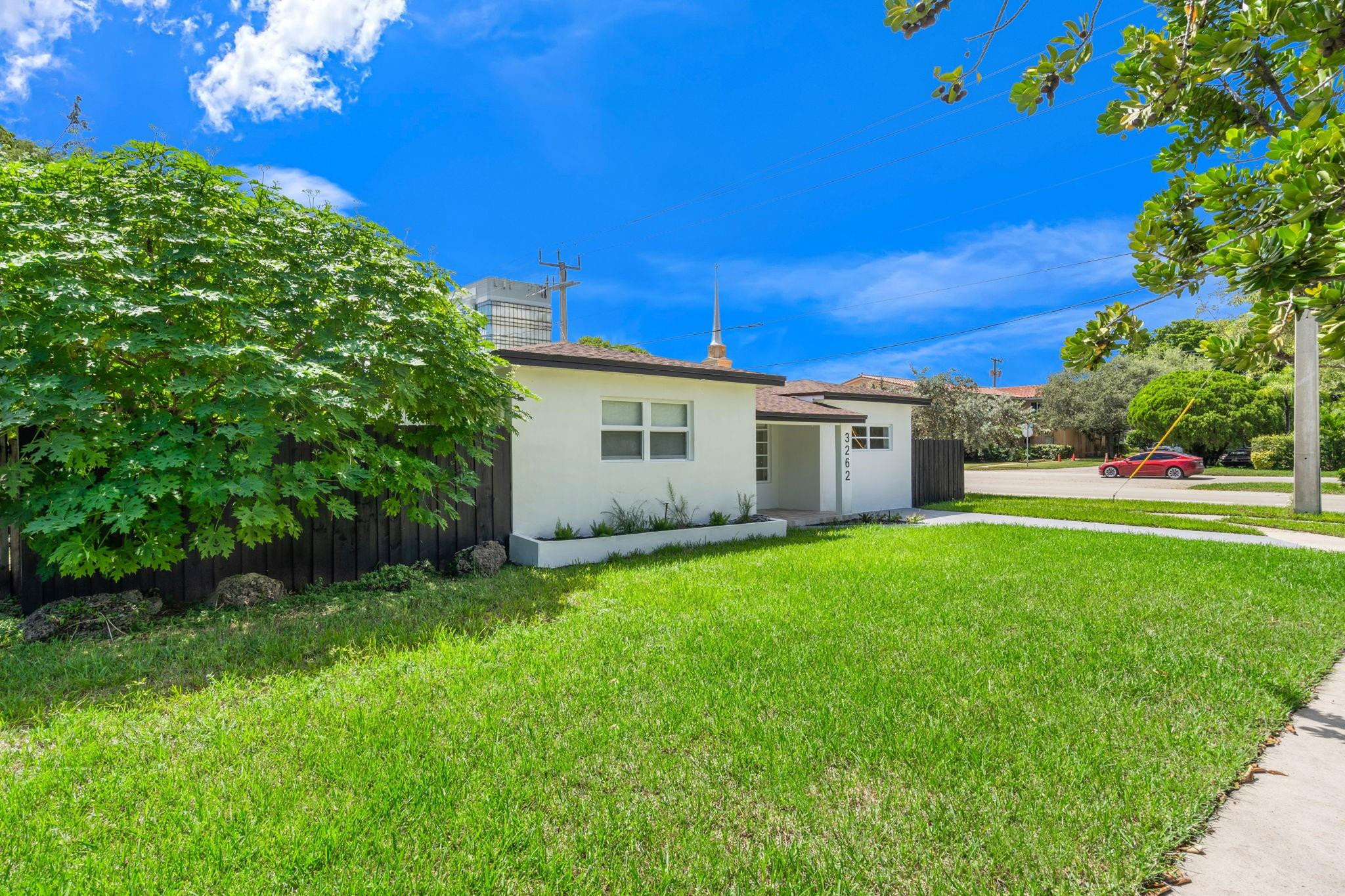 3262 Pierce Street Hollywood, FL 33021 - Photo 3 of 35 a view of a house with backyard and garden