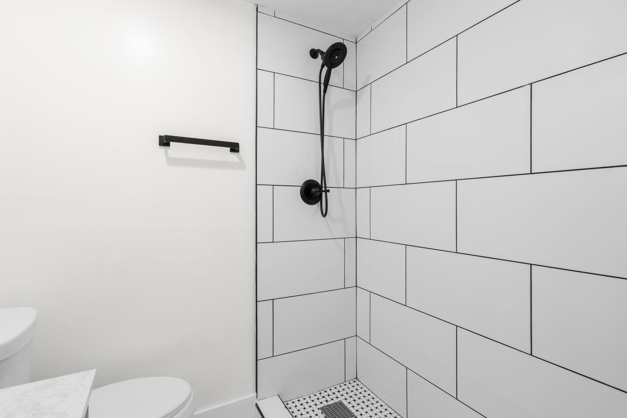 3262 Pierce Street Hollywood, FL 33021 - Photo 31 of 35 a bathroom with a toilet and a shower