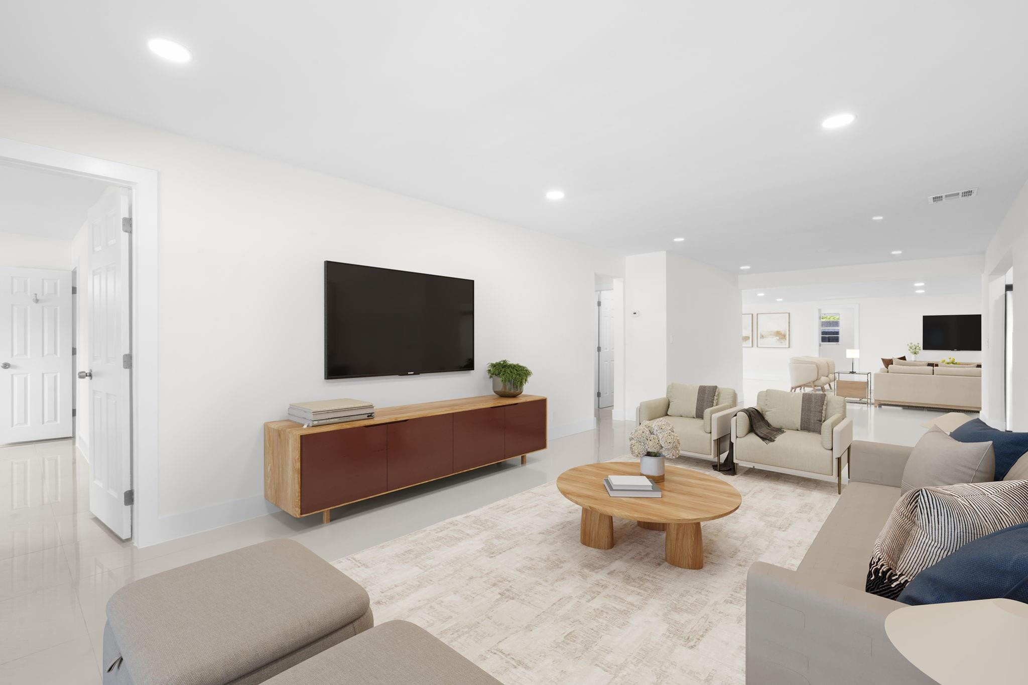 3262 Pierce Street Hollywood, FL 33021 - Photo 5 of 35 a living room with furniture and a flat screen tv