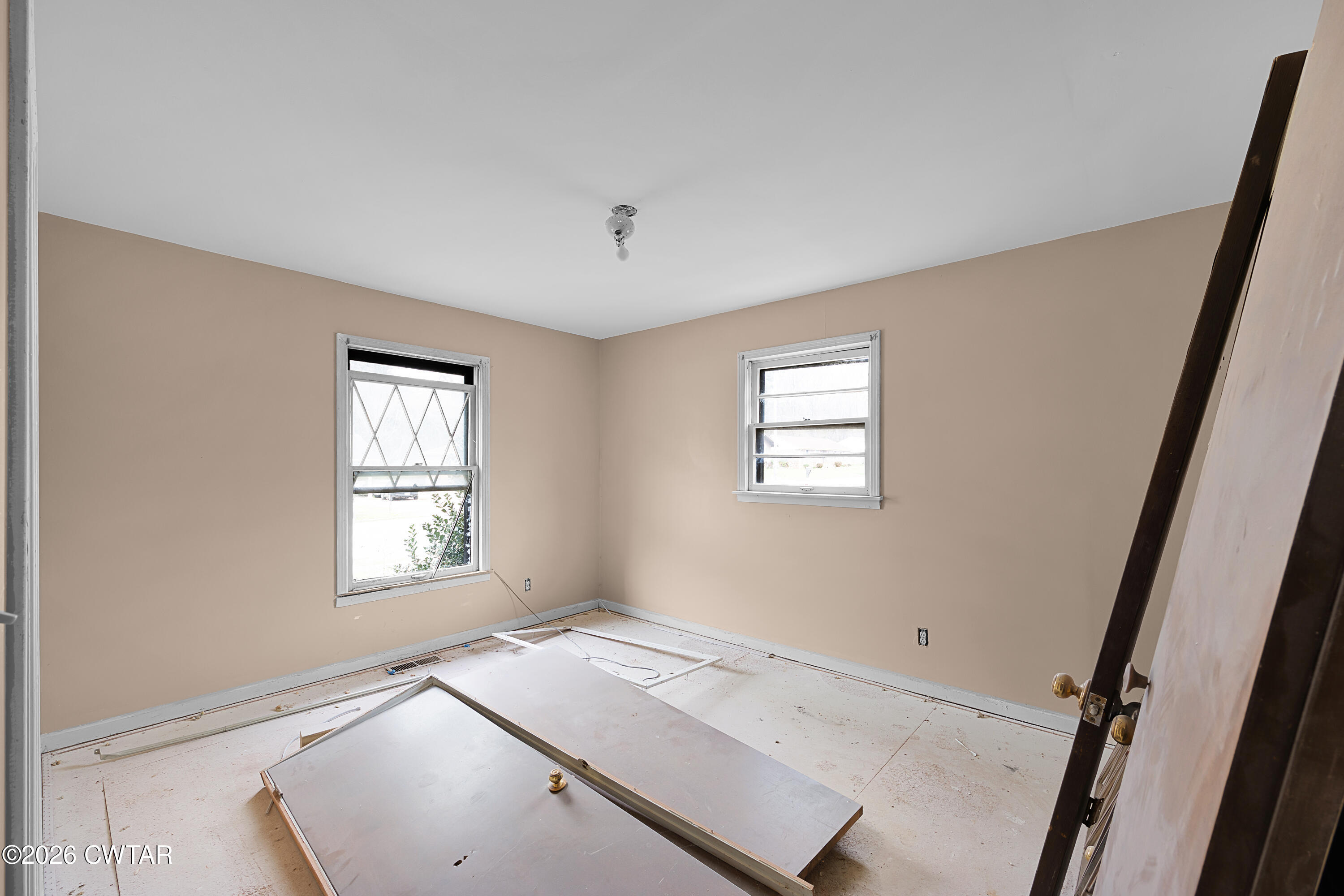 88 Cherokee Drive Jackson, TN 38301 - Photo 13 of 17 a view of an empty room and window