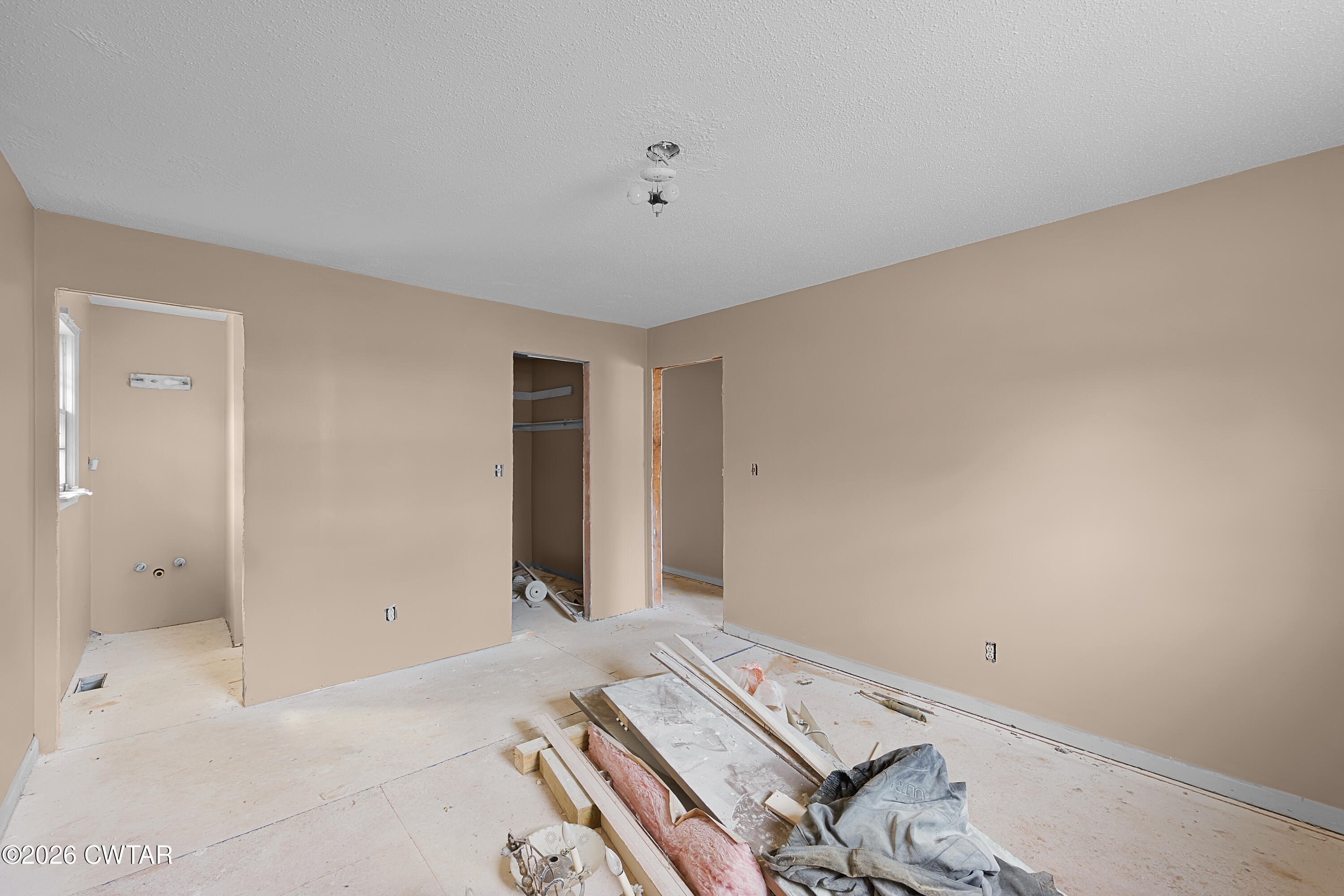 88 Cherokee Drive Jackson, TN 38301 - Photo 15 of 17 a bedroom with a bed and a window