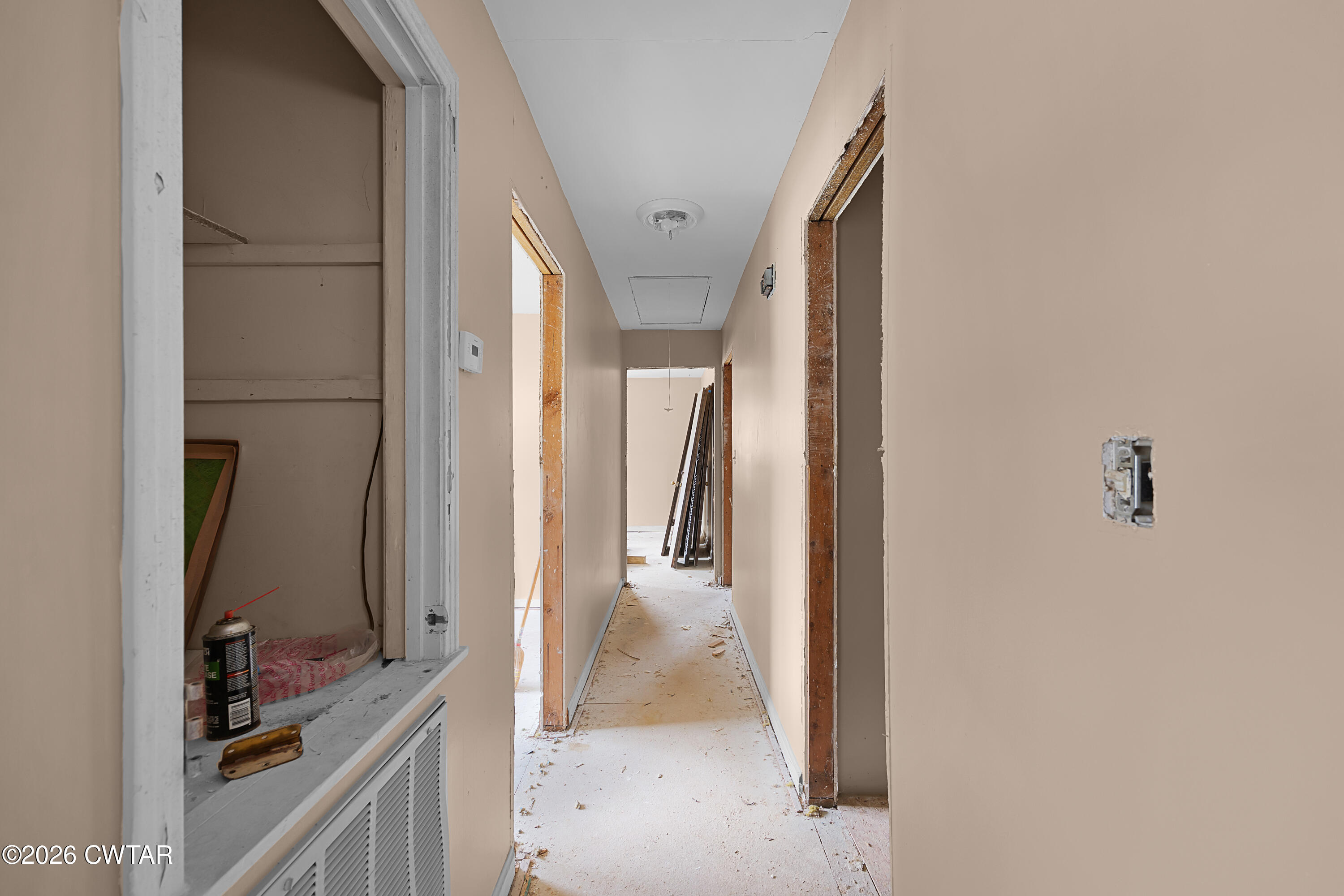 88 Cherokee Drive Jackson, TN 38301 - Photo 17 of 17 a view of a kitchen from the hallway