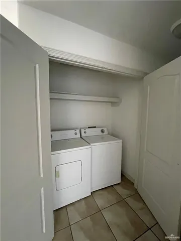 a utility room with cabinets
