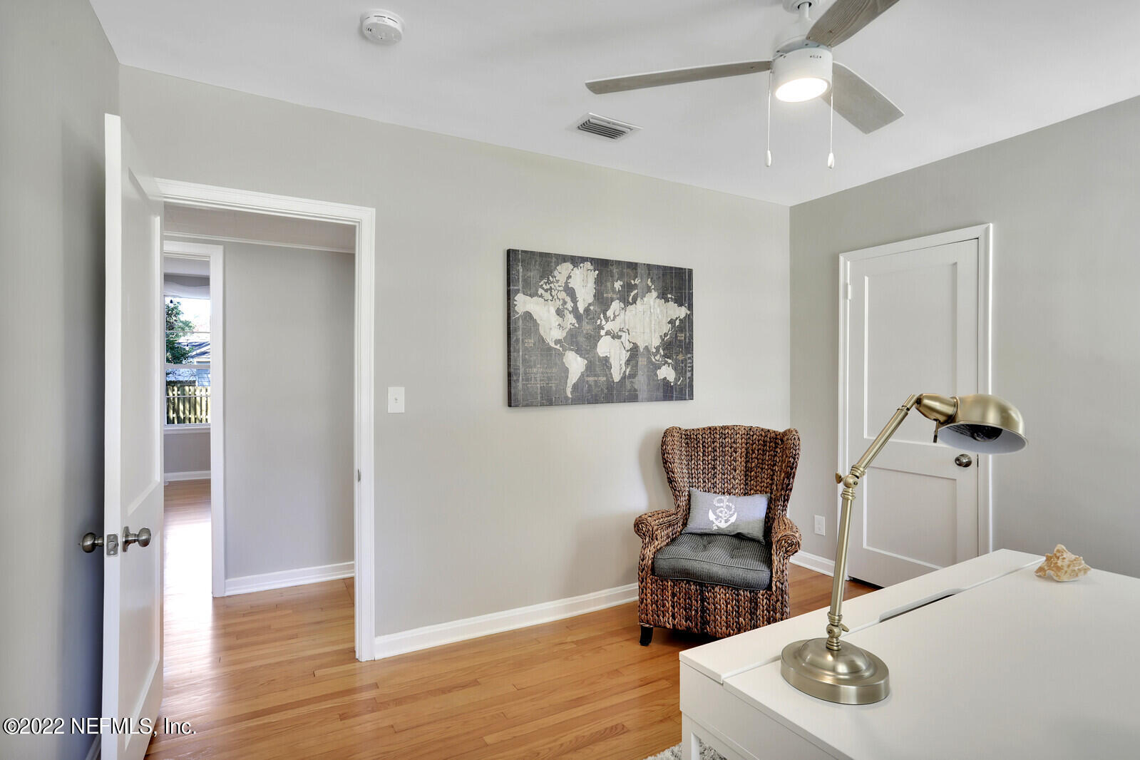 4206 Birmingham Road Jacksonville, FL 32207 - Photo 28 of 32 a room with furniture and wooden floor