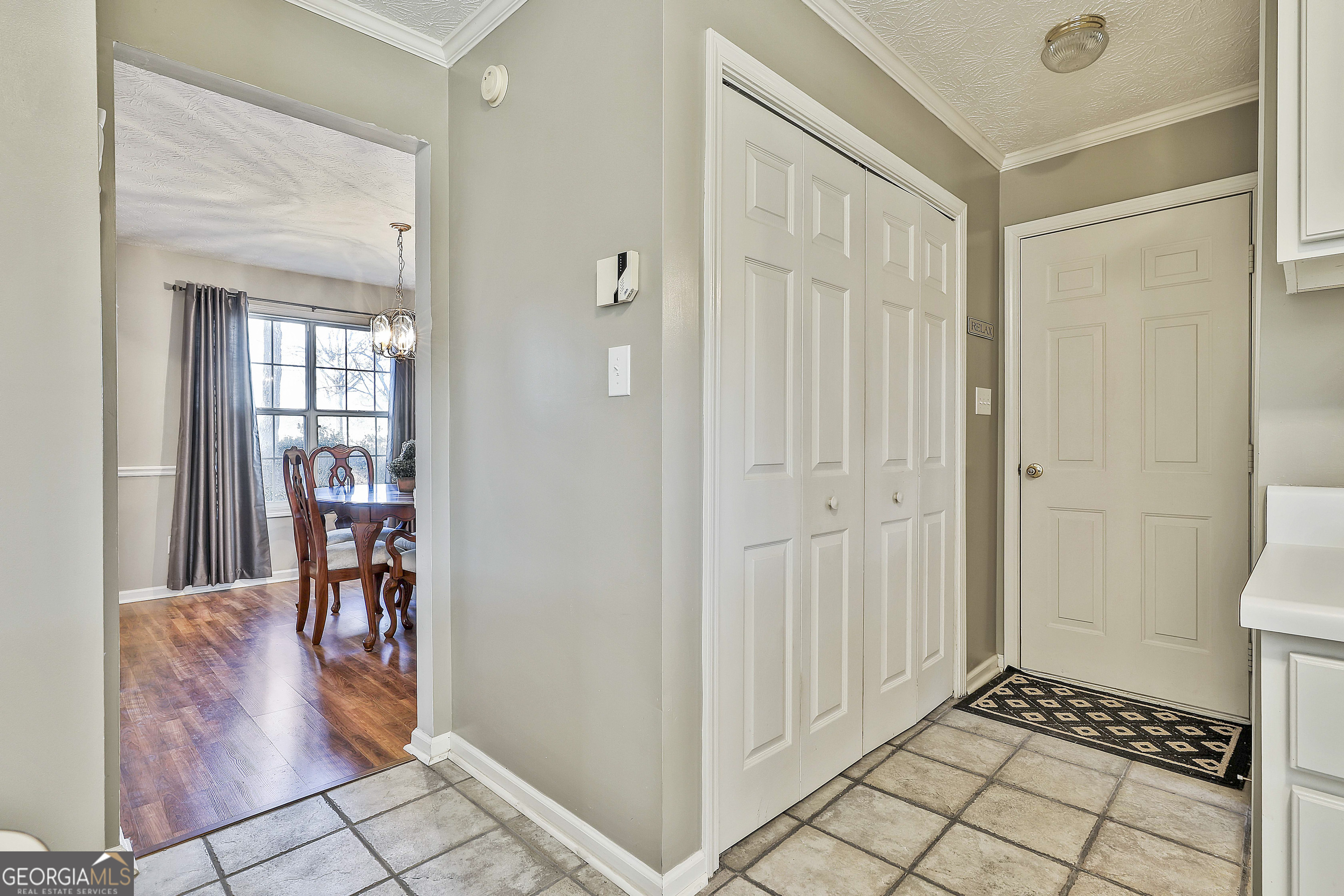 809 Lora Smith Road Newnan, GA 30265 - Photo 20 of 40 a view of a hallway and dining room